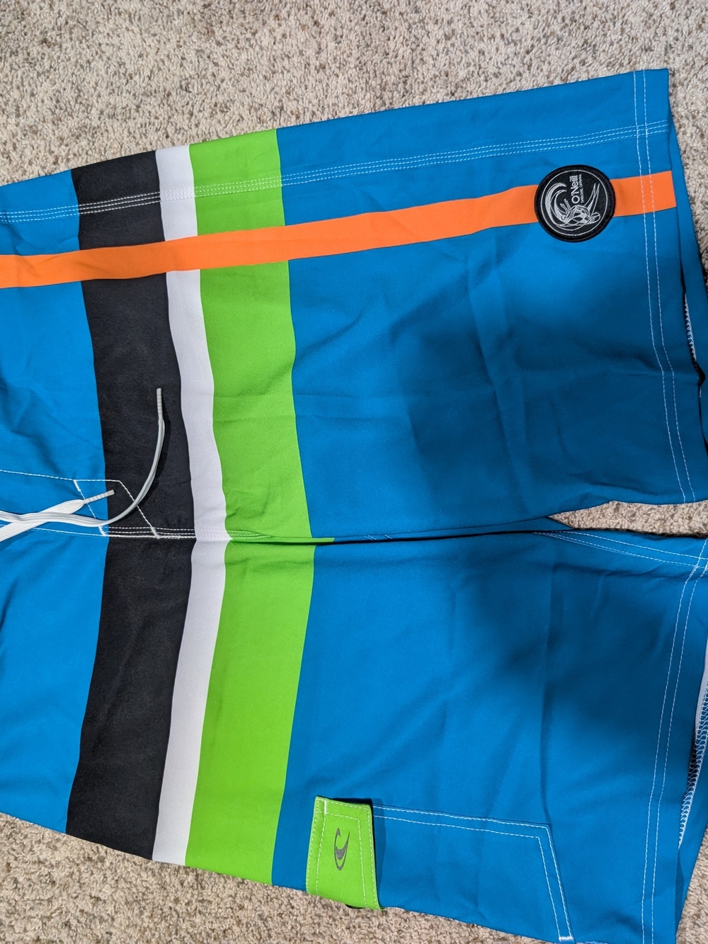 O'Neill Black and Light Blue Board Shorts with Teal Trim
